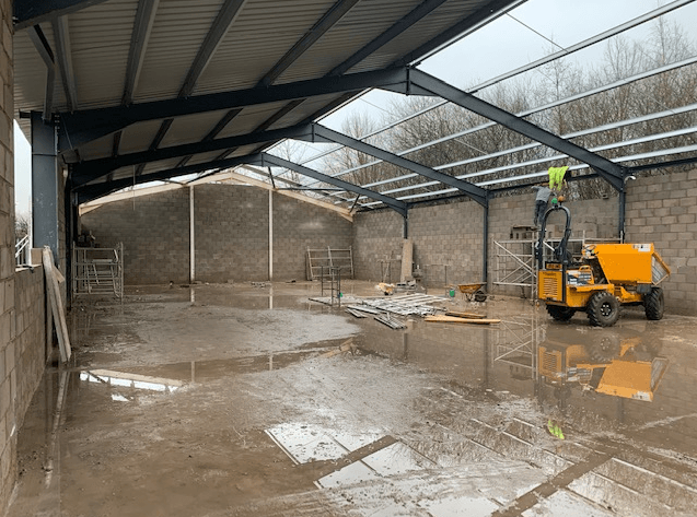 Interior groundworks using an excavator