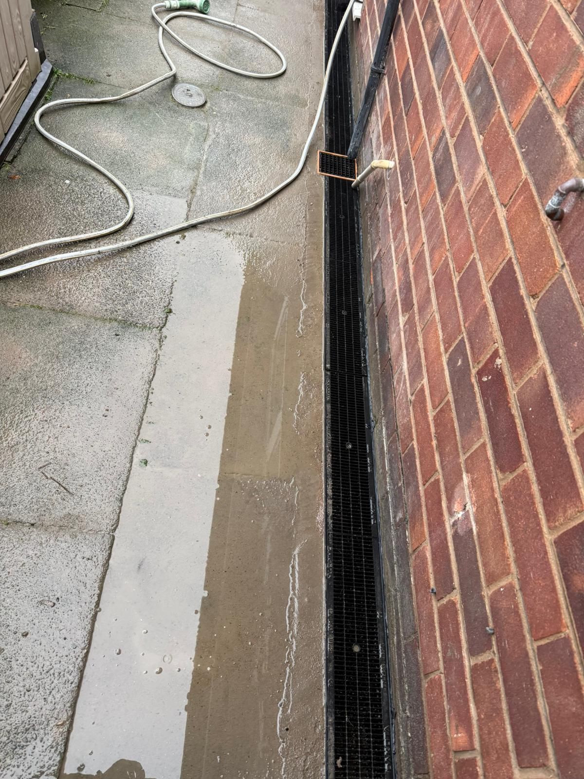 Drainage beside a property wall