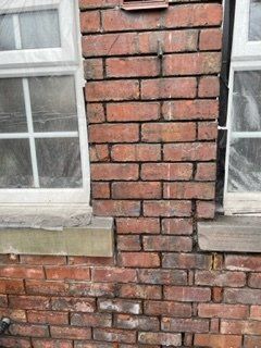 Brickwork repair around a window